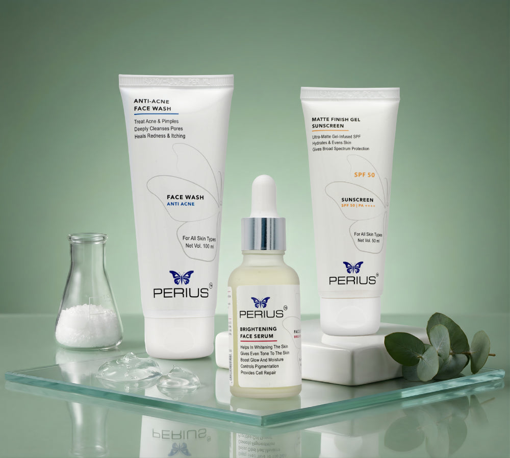 Perius skincare products including face wash, serum, and sunscreen on a glass shelf with a green background.